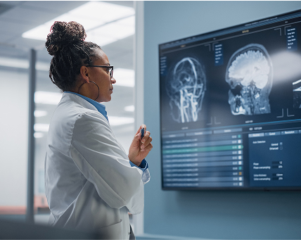 Doctor reviewing MRI of a brain