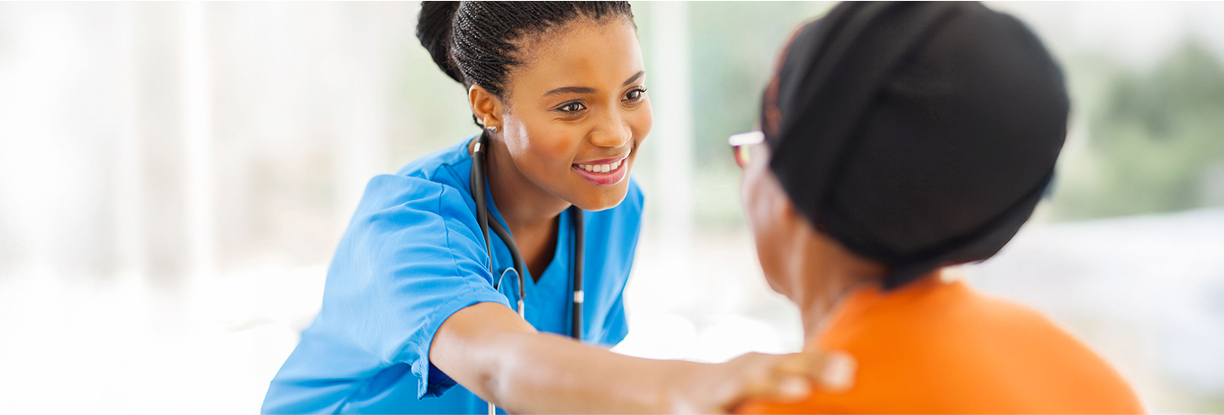 Nurse taking care of patient in medical office